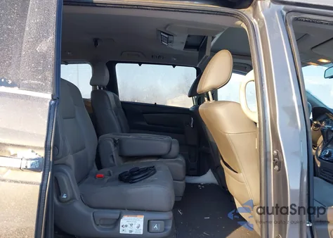 2014 Honda Odyssey Touring/Touring Elite z USA, uszkodzony, nr VIN 5FNRL5H9XEB005892